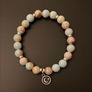 Hand Crafted Blue and Brown Beaded Bracelet with Silver Moon Charm